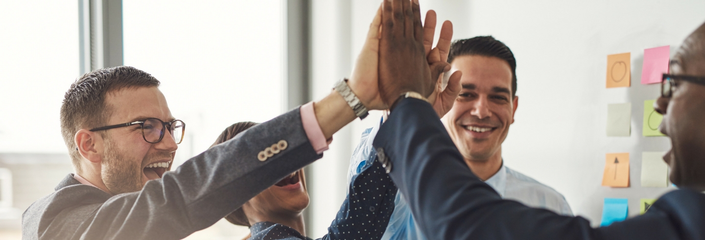 Group high five 1440X490 shutterstock_447034384