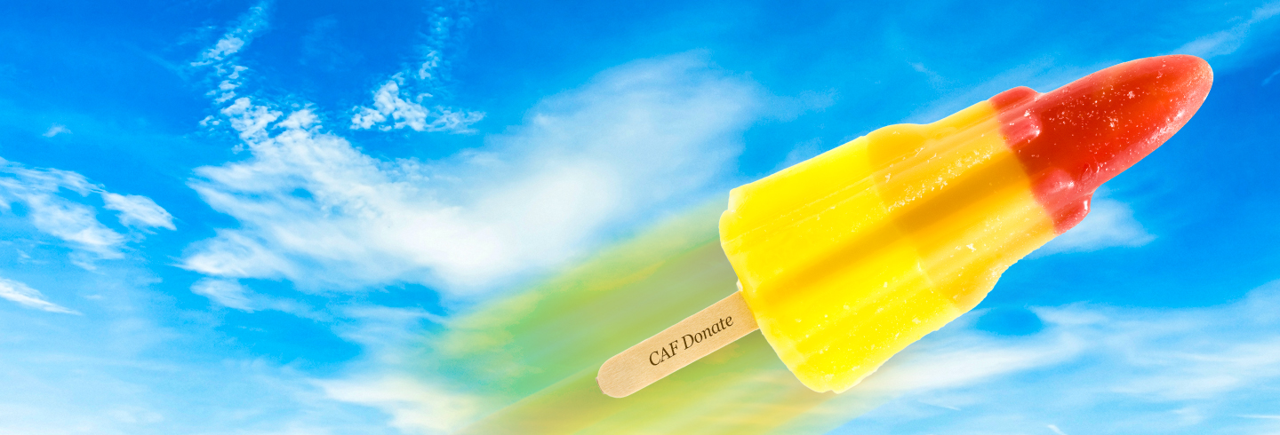 Rocket ice lolly zooming across a summery sky