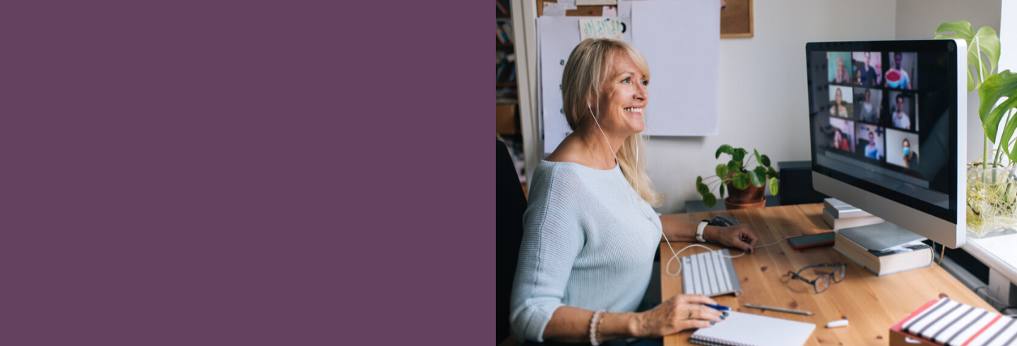 Smiling charity leader holding a team meeting on zoom 