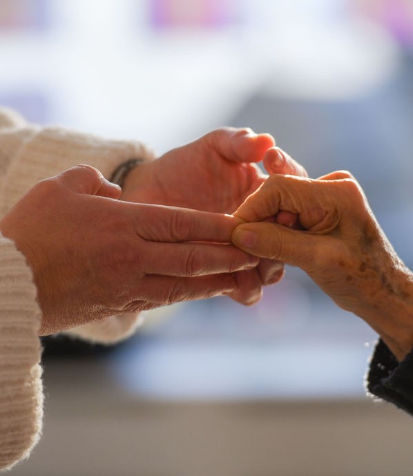Hands giving cropped