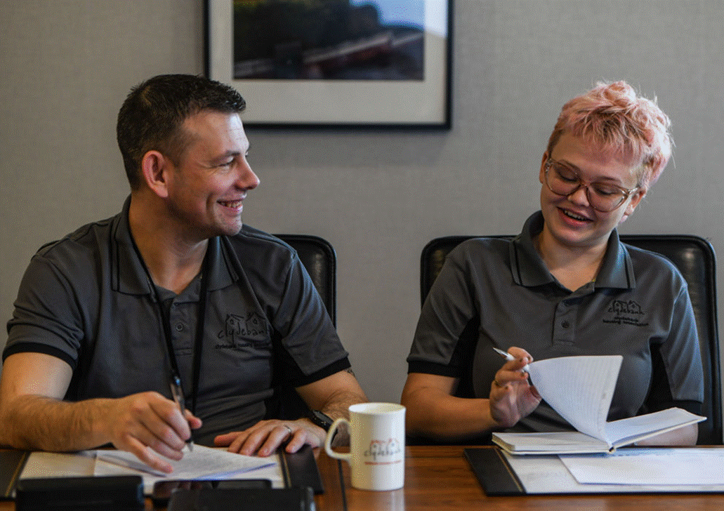 Two people working