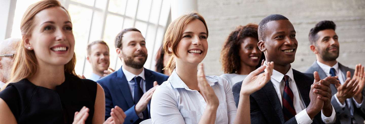 corporate team smiling clapping hero