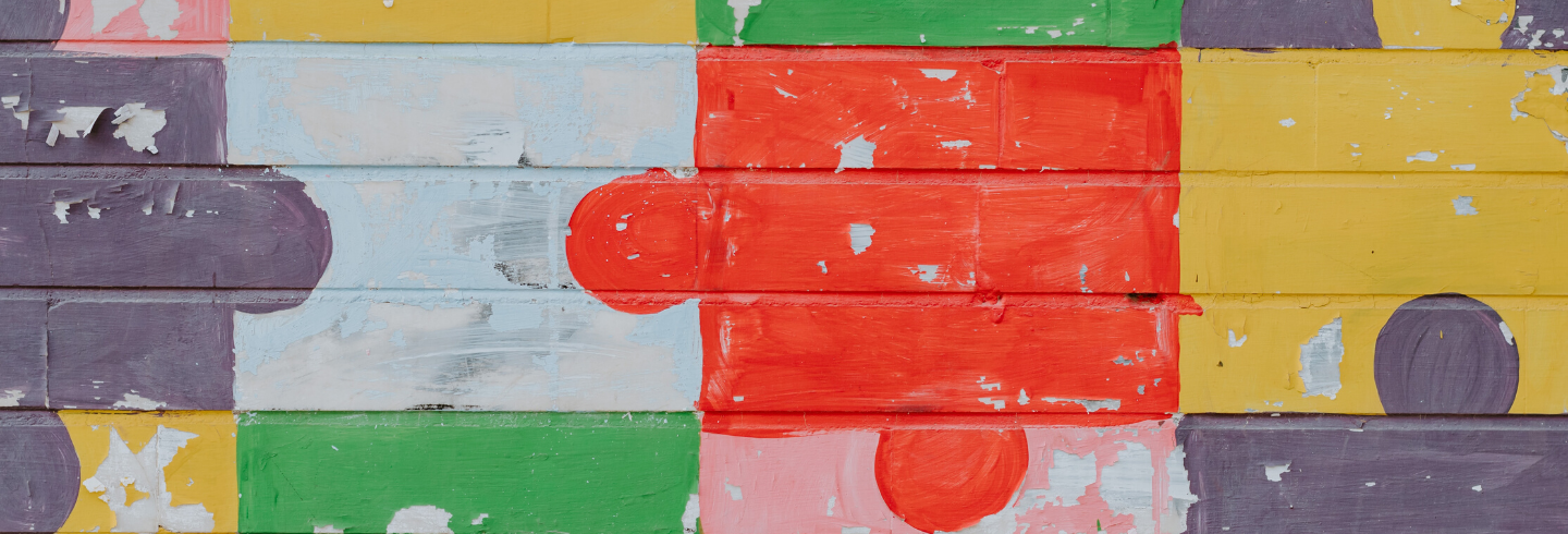 flaky-multicoloured-jigsaw-painted-on-wall